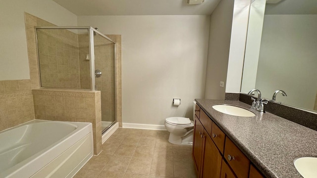 9360 Skokie Blvd Unit 414, Skokie, IL 60077 - full bathroom featuring double vanity, a garden tub, a stall shower, and tile patterned floors