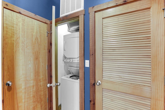 1225 W Greenleaf Ave Unit 3E, Chicago, IL 60626 - laundry room featuring estacked washer and dryer
