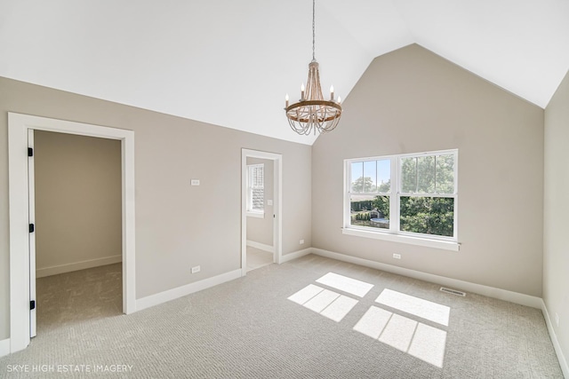 4947 Wilcox Ave, Downers Grove, IL 60515 - unfurnished bedroom featuring a chandelier, light carpet, high vaulted ceiling, and a spacious closet