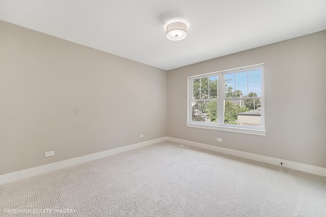 4947 Wilcox Ave, Downers Grove, IL 60515 - empty room featuring light carpet