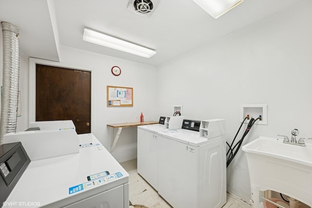 3300 N Carriageway Dr Unit 209, Arlington Heights, IL 60004 - community laundry room with washing machine and dryer and baseboards