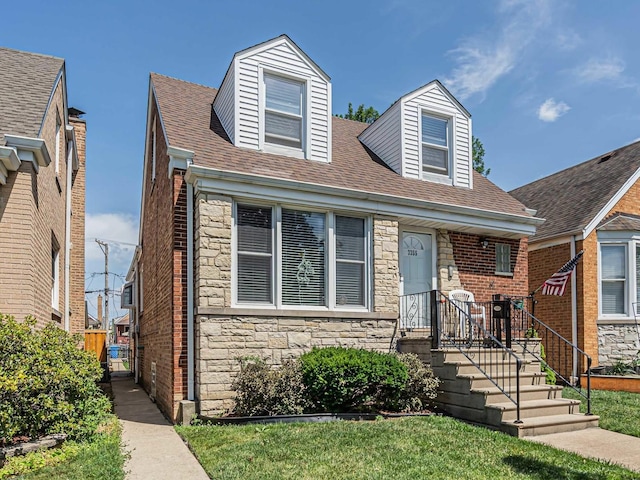 3355 N Neva Ave, Chicago, IL 60634 - view of front of property with stone siding and roof with shingles