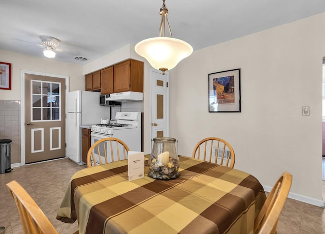 3355 N Neva Ave, Chicago, IL 60634 - dining room with a ceiling fan