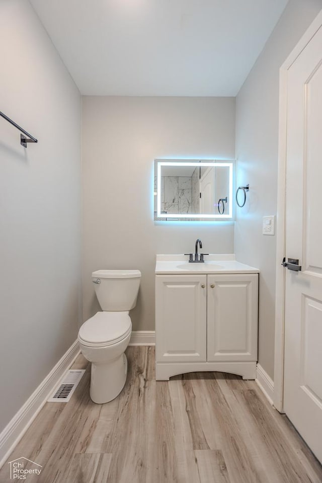 1594 Cornell Cir, Hoffman Estates, IL 60169 - bathroom with vanity and wood finished floors