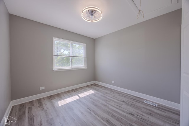 1594 Cornell Cir, Hoffman Estates, IL 60169 - unfurnished room featuring wood finished floors and baseboards