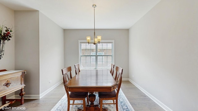 1517 128th St, Lemont, IL 60439 - dining area featuring a chandelier and light wood-style flooring