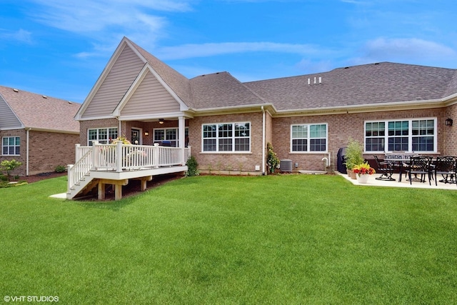 1517 128th St, Lemont, IL 60439 - back of property with a lawn, a deck, ceiling fan, brick siding, and a patio area