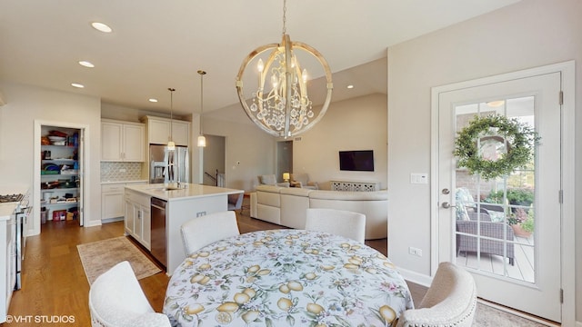 1517 128th St, Lemont, IL 60439 - dining space with a chandelier, wood finished floors, and recessed lighting