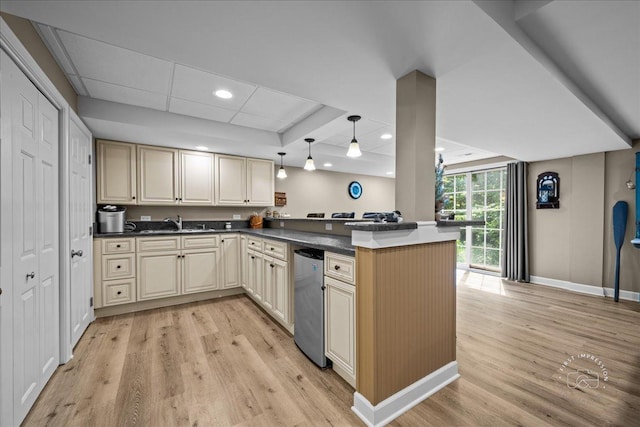 42W285 Retreat Ct Unit 2, Saint Charles, IL 60175 - kitchen with cream cabinetry, light wood finished floors, a peninsula, dark countertops, and recessed lighting