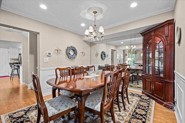42W285 Retreat Ct Unit 2, Saint Charles, IL 60175 - dining space featuring a chandelier, light wood-style flooring, ornamental molding, wainscoting, and recessed lighting