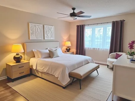 9386 Landings Ln Unit 306, Des Plaines, IL 60016 - bedroom with light wood-style floors and a ceiling fan
