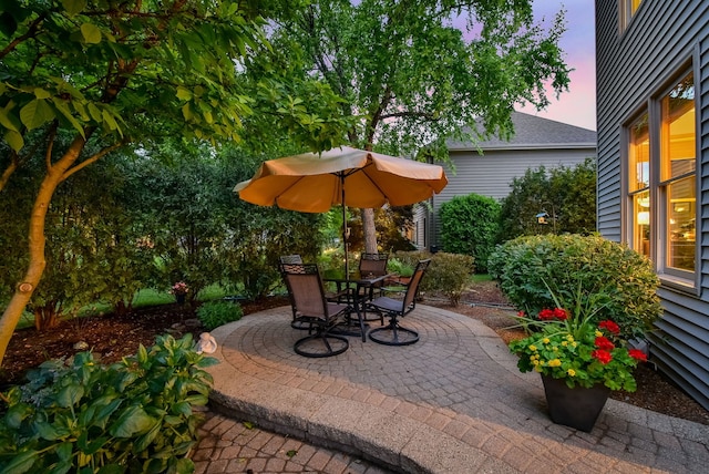 2845 Kendridge Ln, Aurora, IL 60502 - patio terrace at dusk featuring a patio area and outdoor dining space