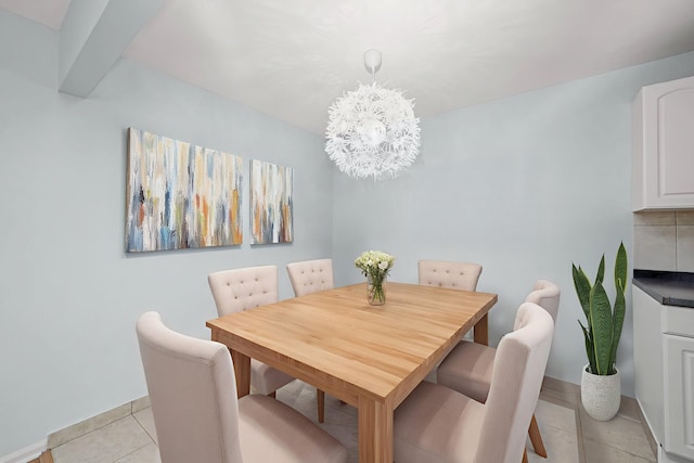 860 E Old Willow Rd Unit 228, Prospect Heights, IL 60070 - dining space with light tile patterned floors and a chandelier