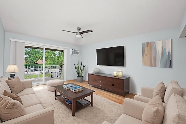 860 E Old Willow Rd Unit 228, Prospect Heights, IL 60070 - living room with wood finished floors, an AC wall unit, and ceiling fan