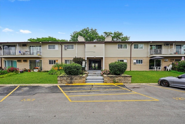 860 E Old Willow Rd Unit 228, Prospect Heights, IL 60070 - view of building exterior with uncovered parking