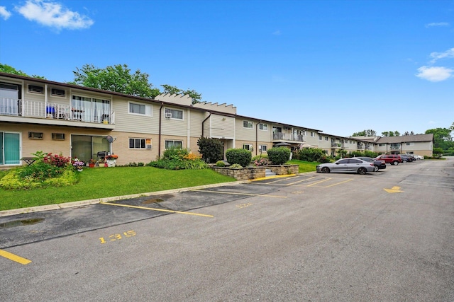 860 E Old Willow Rd Unit 228, Prospect Heights, IL 60070 - view of property featuring uncovered parking and a residential view