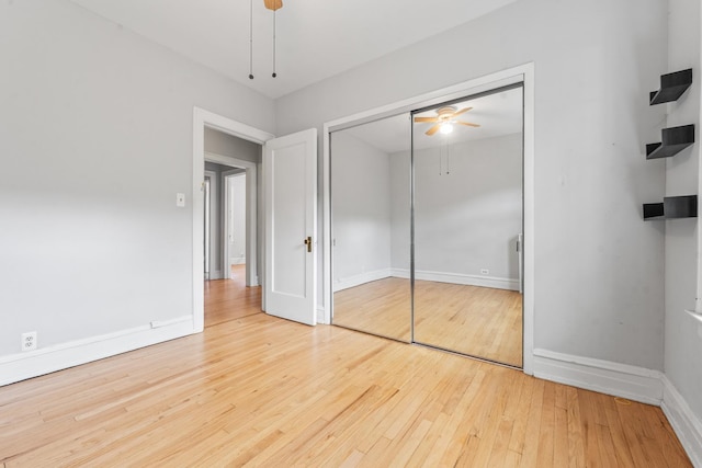 5455 S Ingleside Ave Unit 3E, Chicago, IL 60615 - unfurnished bedroom featuring hardwood / wood-style floors, ceiling fan, and a closet