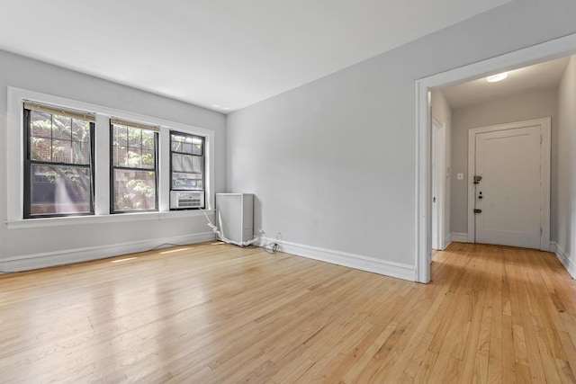 5455 S Ingleside Ave Unit 3E, Chicago, IL 60615 - unfurnished room with light wood-type flooring and cooling unit