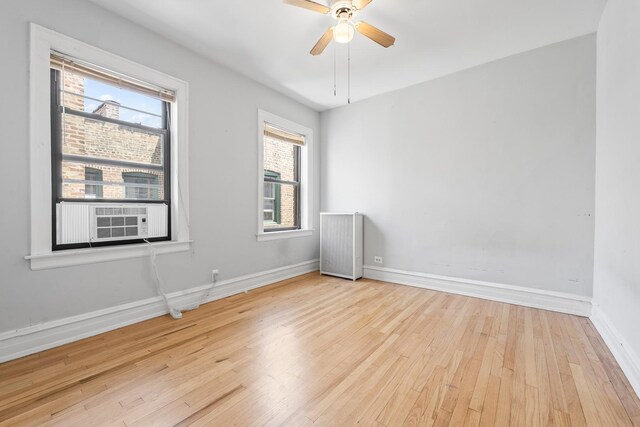 5455 S Ingleside Ave Unit 3E, Chicago, IL 60615 - unfurnished room with wood-type flooring, cooling unit, and a ceiling fan