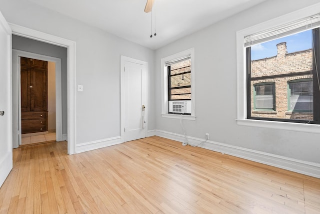 5455 S Ingleside Ave Unit 3E, Chicago, IL 60615 - unfurnished room with light wood-type flooring, healthy amount of natural light, a ceiling fan, and cooling unit