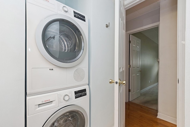 1000 S Lorraine Rd Unit 110, Wheaton, IL 60189 - washroom with stacked washer and clothes dryer and wood finished floors