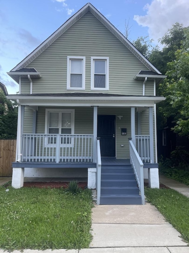 48 E 154th St, Harvey, IL 60426 - view of front facade with a porch