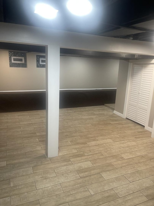 48 E 154th St, Harvey, IL 60426 - finished basement featuring wood finished floors