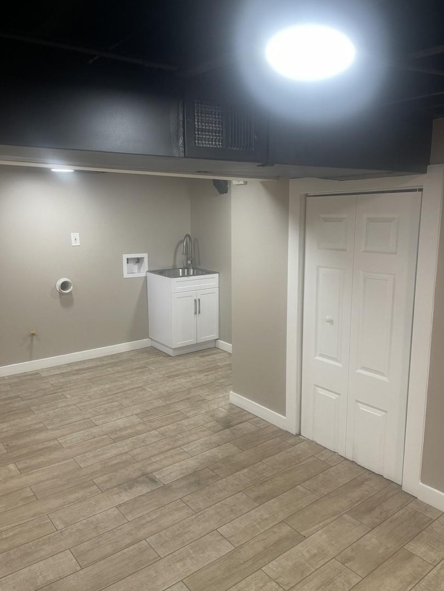 48 E 154th St, Harvey, IL 60426 - laundry area featuring light wood-type flooring and hookup for a washing machine