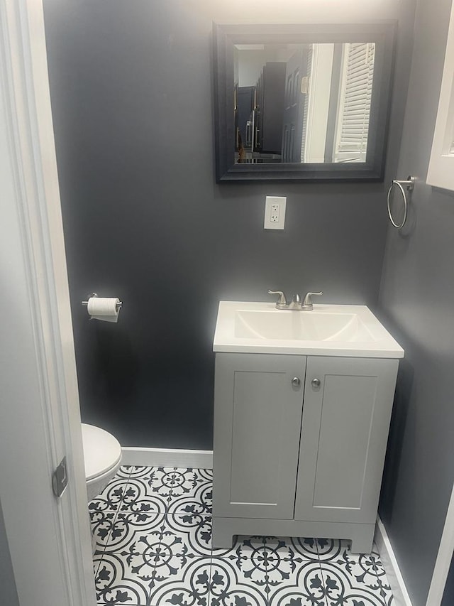 48 E 154th St, Harvey, IL 60426 - half bath with vanity and tile patterned floors
