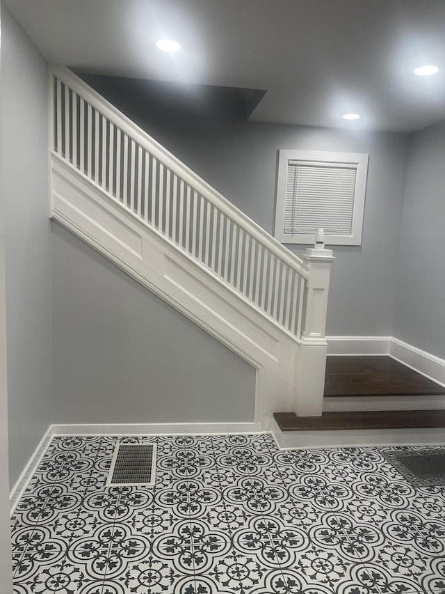 48 E 154th St, Harvey, IL 60426 - stairway with baseboards and recessed lighting
