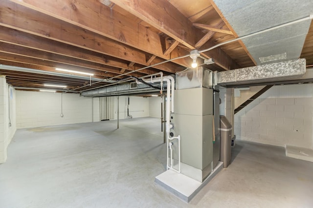 1617 Oakland Ave, Crest Hill, IL 60403 - unfinished basement with concrete block wall and heating unit