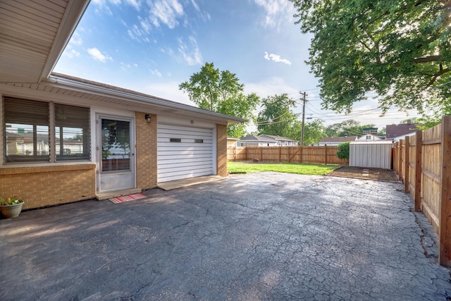 1617 Oakland Ave, Crest Hill, IL 60403 - fenced backyard with a patio and driveway