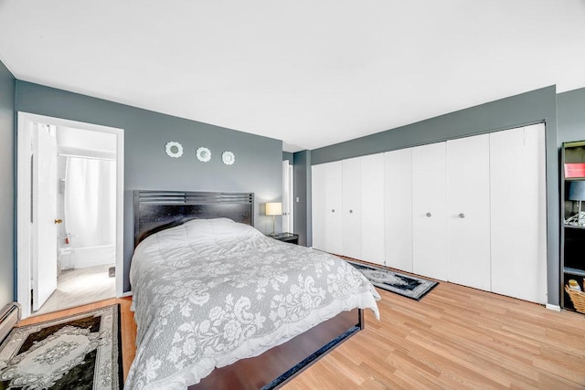 6325 N Sheridan Rd Unit 1903, Chicago, IL 60660 - bedroom with wood finished floors and a baseboard radiator