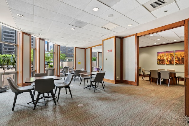 222 N Columbus Dr Unit 2204, Chicago, IL 60601 - dining area with carpet flooring, a wall of windows, a drop ceiling, and recessed lighting