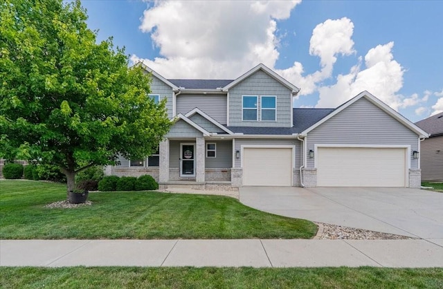 5108 Longfield Rd, Bloomington, IL 61705 - craftsman-style home featuring driveway, a front lawn, brick siding, and an attached garage