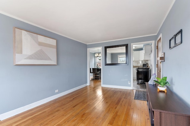 2204 S 9th Ave Unit 2, Broadview, IL 60155 - living room featuring light wood finished floors and ornamental molding