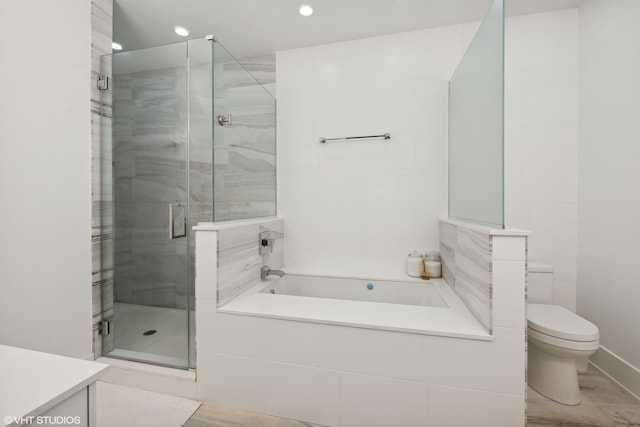 2814 W N Ave Unit 2W, Chicago, IL 60647 - bathroom with a garden tub, a shower stall, recessed lighting, and vanity