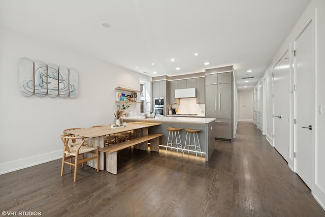 2814 W N Ave Unit 2W, Chicago, IL 60647 - dining area with dark wood-style floors and recessed lighting
