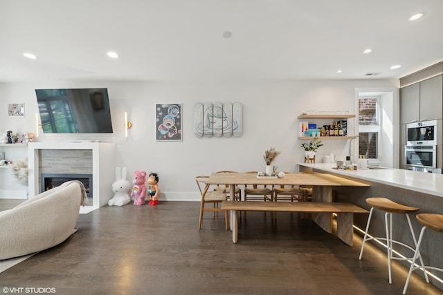 2814 W N Ave Unit 2W, Chicago, IL 60647 - dining room featuring dark wood finished floors, recessed lighting, and a fireplace