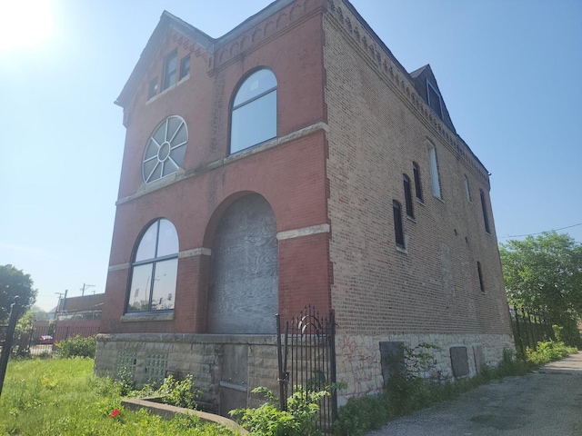 311 W Garfield Blvd, Chicago, IL 60621 - view of home's exterior with brick siding