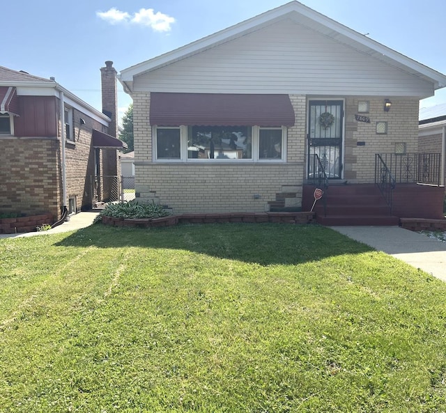 7809 S Christiana Ave, Chicago, IL 60652 - view of front of home featuring brick siding, a front yard, and a porch