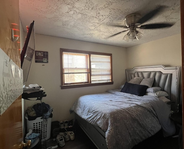 7809 S Christiana Ave, Chicago, IL 60652 - bedroom featuring a textured ceiling and a ceiling fan