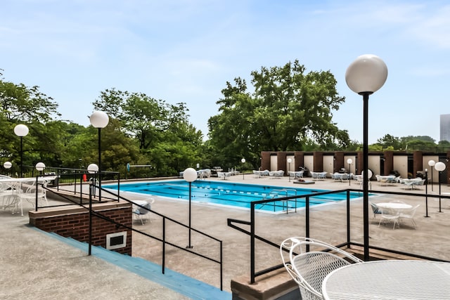 5455 N Sheridan Rd Unit 3203, Chicago, IL 60640 - community pool featuring a patio area