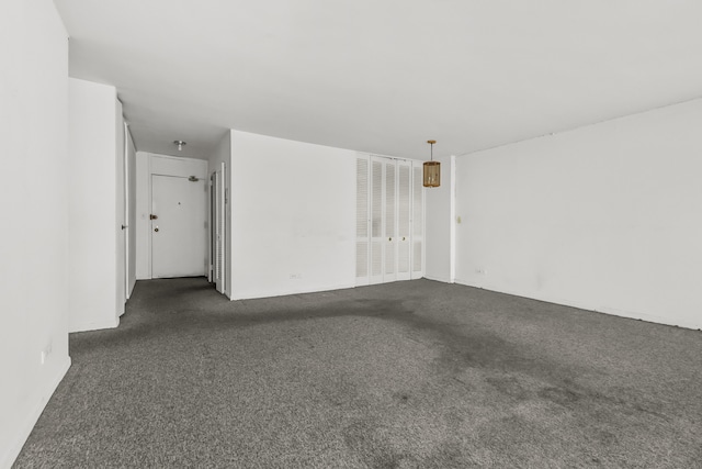 5455 N Sheridan Rd Unit 3203, Chicago, IL 60640 - unfurnished room with dark carpet