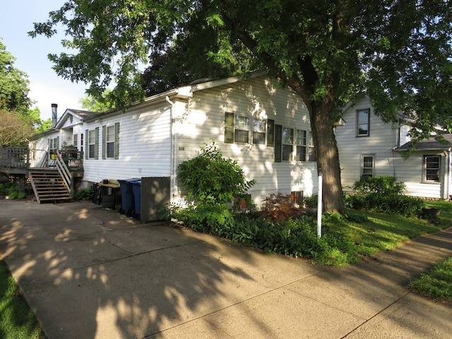 510 7th St, Mazon, IL 60444 - view of home's exterior featuring a wooden deck