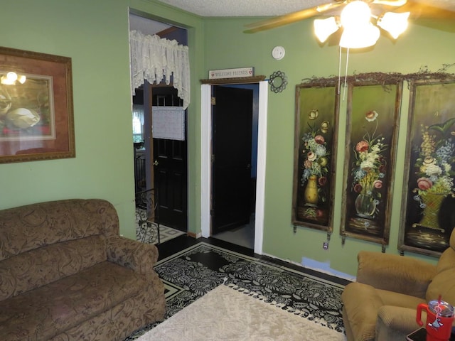 510 7th St, Mazon, IL 60444 - living area with a ceiling fan and tile patterned flooring