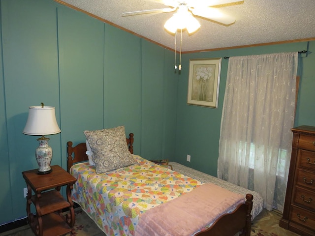 510 7th St, Mazon, IL 60444 - bedroom with crown molding, a textured ceiling, and ceiling fan