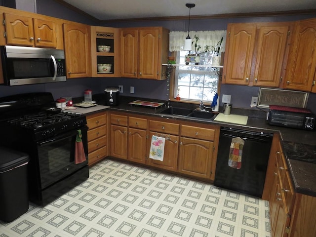 510 7th St, Mazon, IL 60444 - kitchen with black appliances, brown cabinetry, crown molding, dark countertops, and light floors
