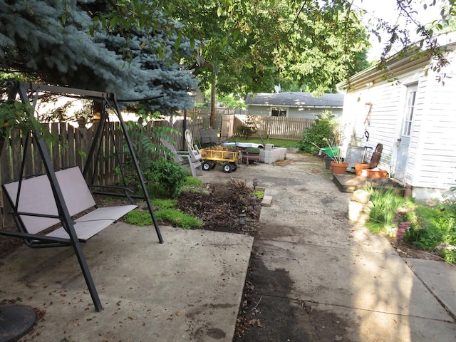 510 7th St, Mazon, IL 60444 - fenced backyard featuring a patio area
