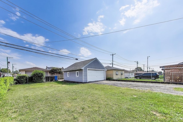 5949 W 55th St, Chicago, IL 60638 - view of yard featuring an outbuilding and a detached garage